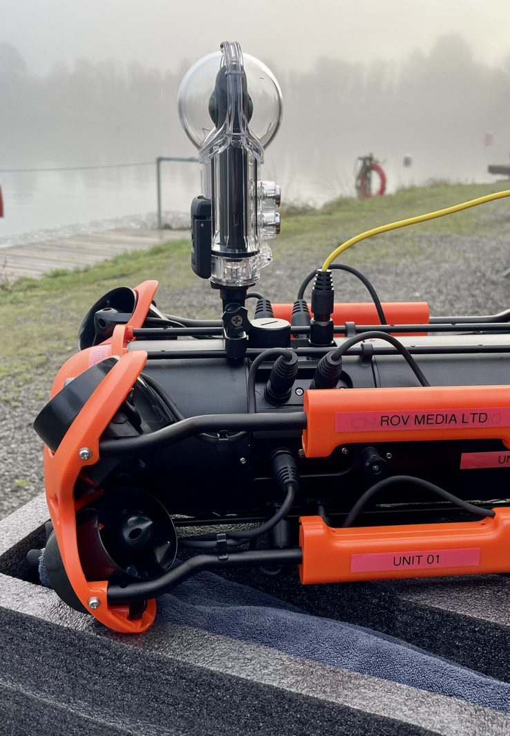 Close view of the orange remotely operated vehicle used for underwater inspection